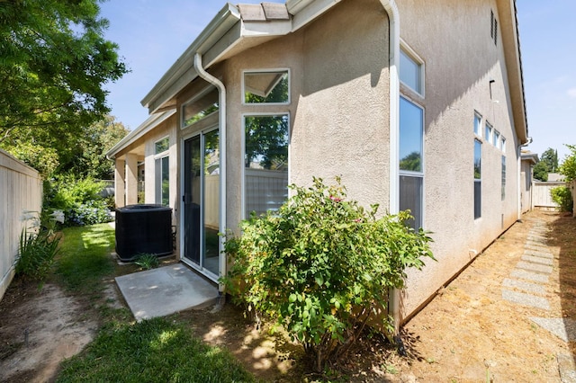 5125 N Via Amore, Fresno, CA 93711 - view of side of property featuring cooling unit and stucco siding