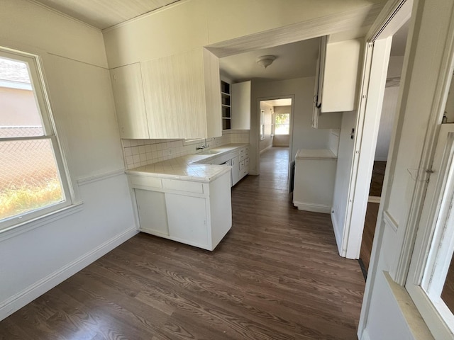 1305 E Fedora Ave, Fresno, CA 93704 - kitchen featuring a sink, dark wood-style floors, baseboards, and tile countertops
