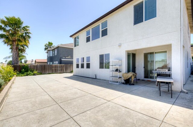 2701 Glade Ave, Madera, CA 93637 - back of property with a patio area and stucco siding