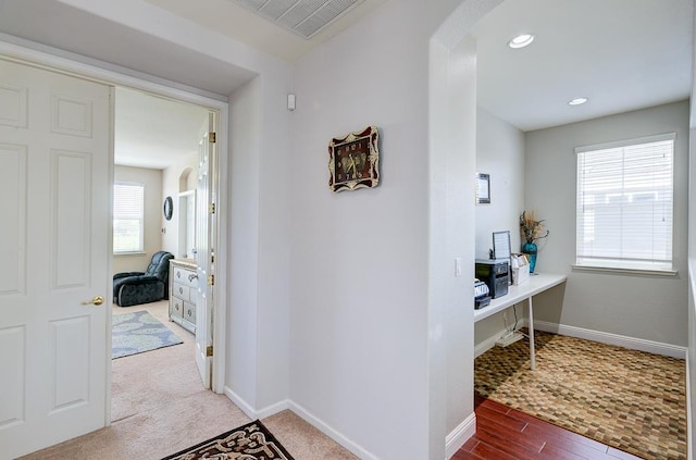 2701 Glade Ave, Madera, CA 93637 - hallway with arched walkways, baseboards, a desk, recessed lighting, and wood finished floors