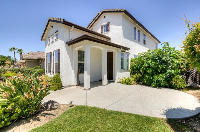 2701 Glade Ave, Madera, CA 93637 - rear view of property featuring a patio and stucco siding
