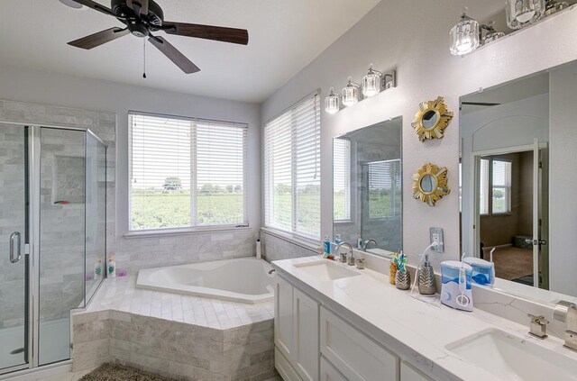 2701 Glade Ave, Madera, CA 93637 - bathroom with plenty of natural light, a bath, and a stall shower