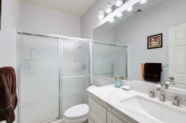 2701 Glade Ave, Madera, CA 93637 - full bathroom featuring vanity, a stall shower, and toilet
