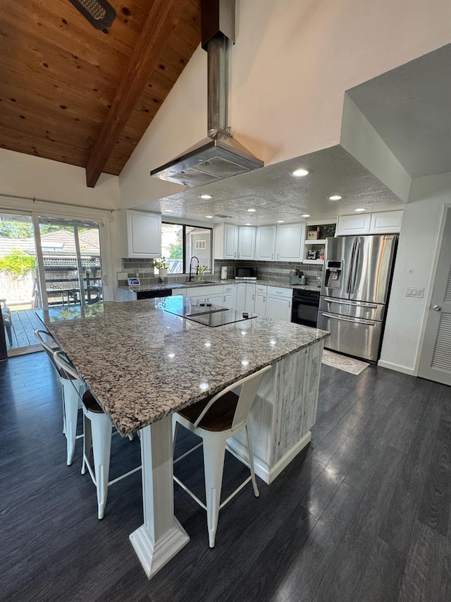 6762 N Knoll Ave, Fresno, CA 93711 - kitchen with black appliances, dark wood-type flooring, white cabinets, light stone counters, and a sink