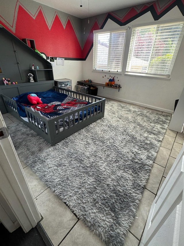 6762 N Knoll Ave, Fresno, CA 93711 - recreation room with tile patterned floors and baseboards