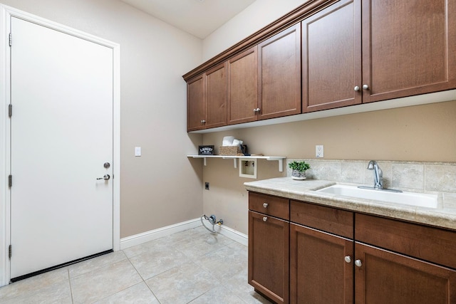 1977 N Dara Ave, Clovis, CA 93619 - washroom with hookup for a washing machine, hookup for an electric dryer, cabinet space, gas dryer hookup, and baseboards