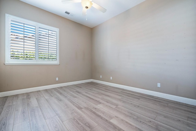 1977 N Dara Ave, Clovis, CA 93619 - spare room with wood finished floors, a ceiling fan, and baseboards