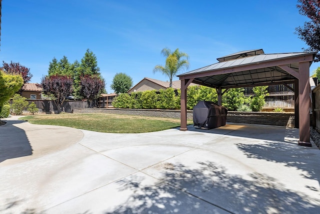 1977 N Dara Ave, Clovis, CA 93619 - view of patio / terrace featuring a gazebo, a carport, grilling area, and driveway