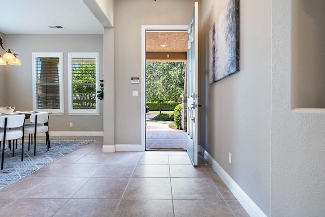 1977 N Dara Ave, Clovis, CA 93619 - foyer featuring healthy amount of natural light and tile patterned floors