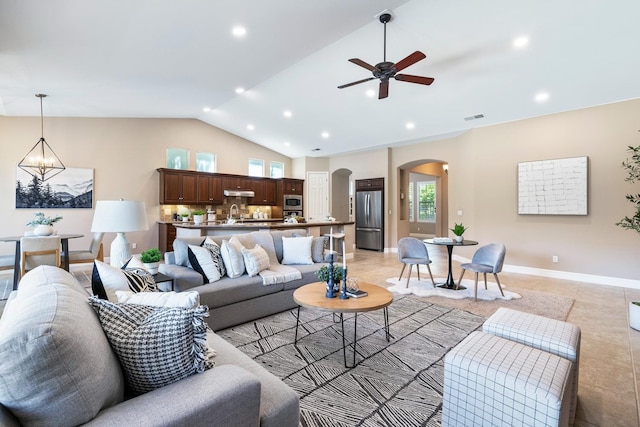 1977 N Dara Ave, Clovis, CA 93619 - living room featuring arched walkways, ceiling fan, lofted ceiling, recessed lighting, and a chandelier
