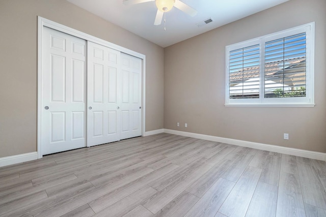 1977 N Dara Ave, Clovis, CA 93619 - unfurnished bedroom with light wood-style flooring, a closet, baseboards, and ceiling fan