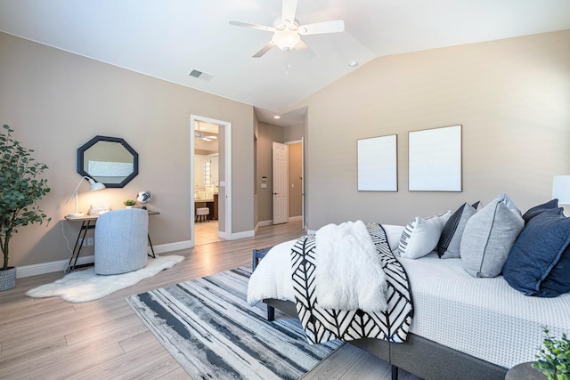 1977 N Dara Ave, Clovis, CA 93619 - bedroom with light wood finished floors, baseboards, lofted ceiling, ceiling fan, and ensuite bathroom