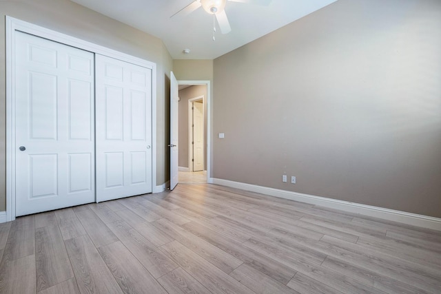 1977 N Dara Ave, Clovis, CA 93619 - unfurnished bedroom with light wood-type flooring, baseboards, and a closet