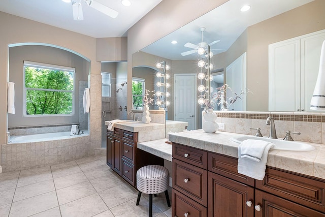 1977 N Dara Ave, Clovis, CA 93619 - bathroom featuring a ceiling fan, vanity, a garden tub, tile patterned floors, and recessed lighting