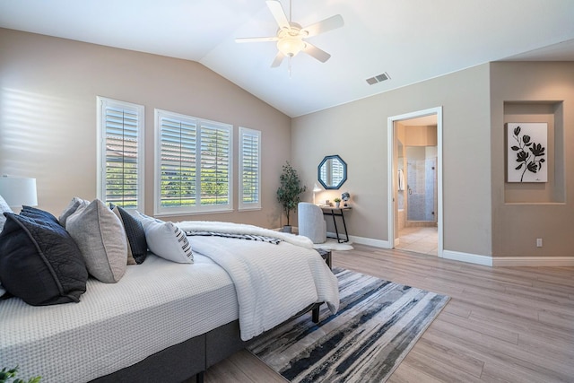1977 N Dara Ave, Clovis, CA 93619 - bedroom featuring light wood-type flooring, vaulted ceiling, baseboards, a ceiling fan, and ensuite bath