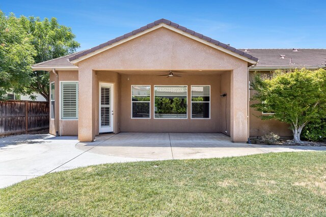 1977 N Dara Ave, Clovis, CA 93619 - rear view of property featuring a ceiling fan, stucco siding, a patio, and a tiled roof