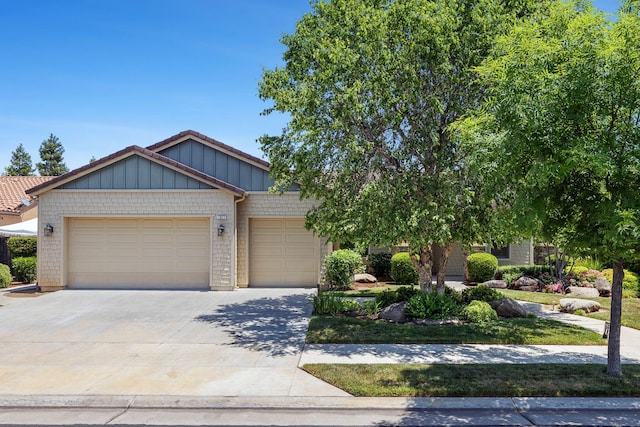 1977 N Dara Ave, Clovis, CA 93619 - view of front of property with a garage and driveway