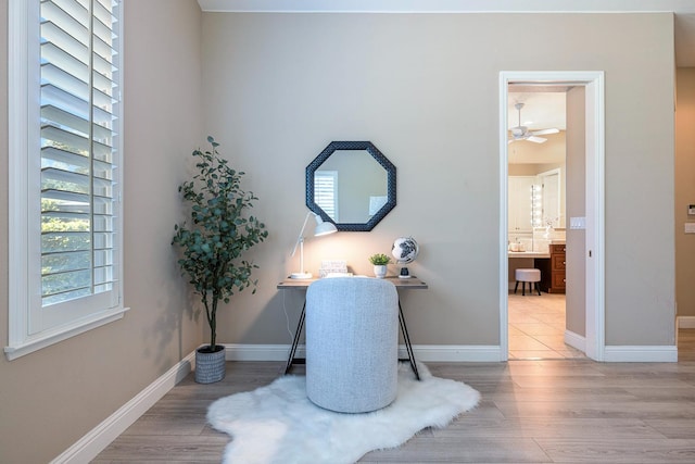 1977 N Dara Ave, Clovis, CA 93619 - detailed view of wood finished floors, a ceiling fan, and baseboards