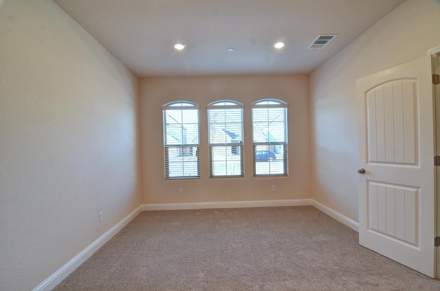 2129 La Canada Ave, Clovis, CA 93619 - empty room featuring light carpet, baseboards, and recessed lighting