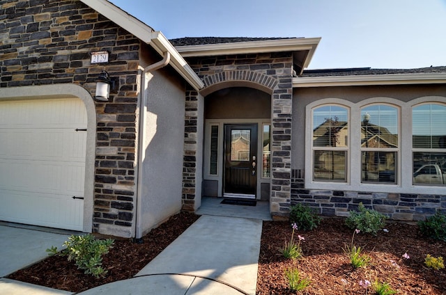 2129 La Canada Ave, Clovis, CA 93619 - entrance to property with stone siding and an attached garage