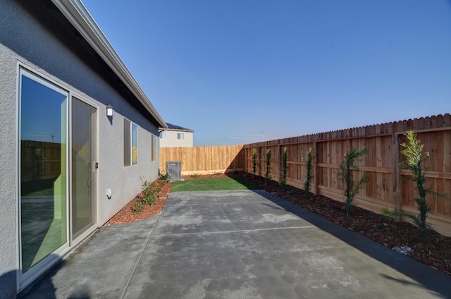 2129 La Canada Ave, Clovis, CA 93619 - fenced backyard featuring central AC and a patio area