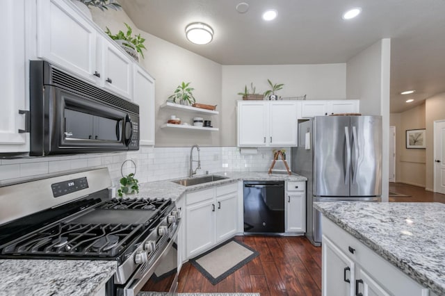 2602 E Pryor Dr, Fresno, CA 93720 - kitchen featuring black appliances, a sink, dark wood finished floors, white cabinetry, and recessed lighting