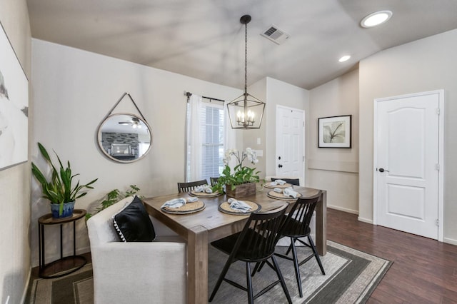 2602 E Pryor Dr, Fresno, CA 93720 - dining room featuring a chandelier, dark wood-style floors, vaulted ceiling, recessed lighting, and baseboards