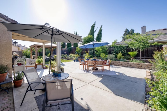 2602 E Pryor Dr, Fresno, CA 93720 - fenced backyard featuring outdoor dining area, a gazebo, and a patio