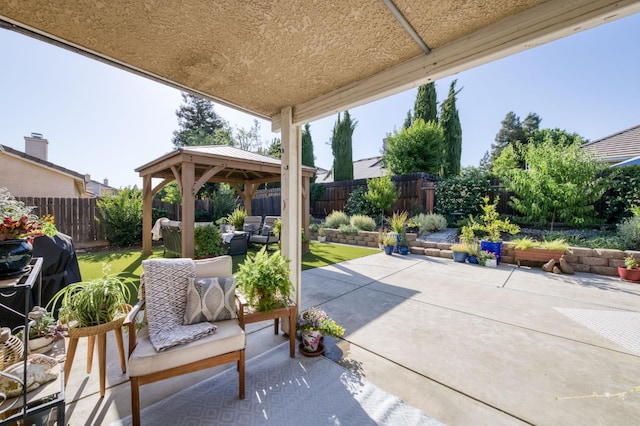 2602 E Pryor Dr, Fresno, CA 93720 - fenced backyard featuring a gazebo, an outdoor hangout area, and a patio