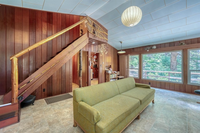 1140 Pine St, Fish Camp, CA 93623 - living room featuring wood walls and vaulted ceiling