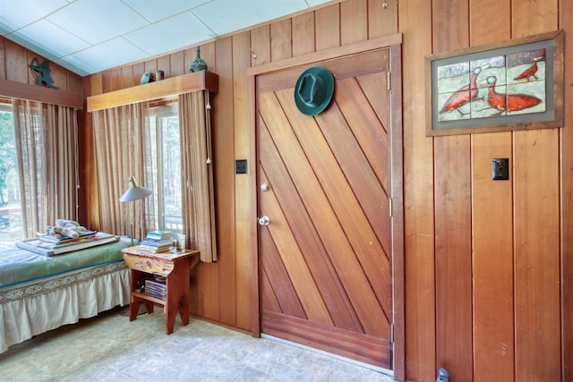 1140 Pine St, Fish Camp, CA 93623 - bedroom featuring wooden walls and lofted ceiling