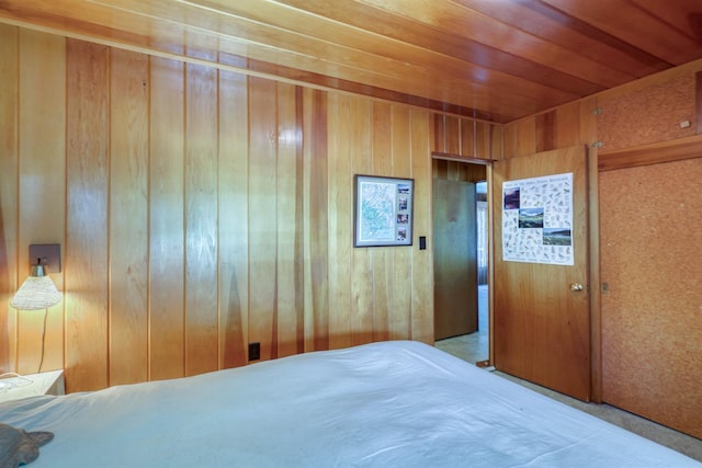 1140 Pine St, Fish Camp, CA 93623 - bedroom featuring carpet floors, wooden walls, and wood ceiling