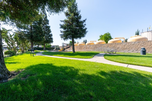 704 Rancho Vista Dr, Atwater, CA 95301 - view of community with a lawn