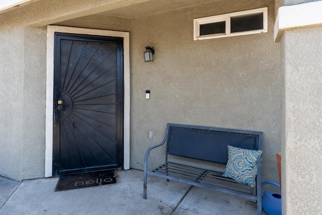 704 Rancho Vista Dr, Atwater, CA 95301 - doorway to property with stucco siding