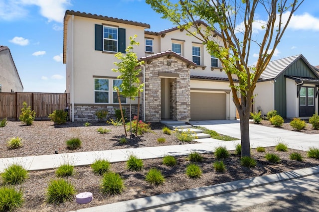 560 Overstone Ave, Madera, CA 93636 - view of front of property with stucco siding, stone siding, and a tiled roof