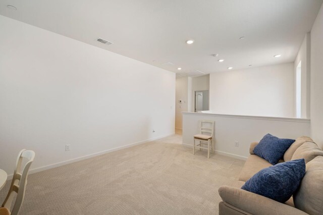 560 Overstone Ave, Madera, CA 93636 - living area featuring light carpet, recessed lighting, and baseboards
