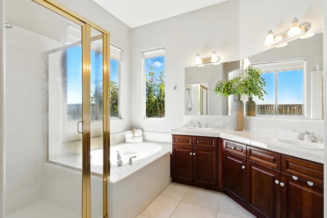 2721 Stuart Ave, Clovis, CA 93611 - bathroom featuring plenty of natural light, a shower stall, double vanity, and a garden tub