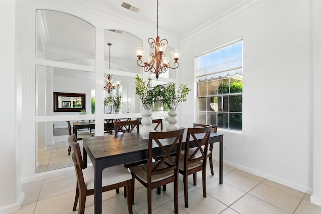 2721 Stuart Ave, Clovis, CA 93611 - dining space with a chandelier, ornamental molding, light tile patterned flooring, baseboards, and a high ceiling