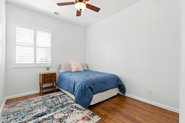 2721 Stuart Ave, Clovis, CA 93611 - bedroom featuring wood finished floors, baseboards, and a ceiling fan