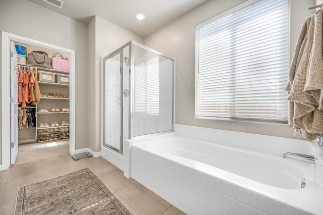6085 E Homan Ave, Fresno, CA 93727 - bathroom with a bath, a stall shower, healthy amount of natural light, and tile patterned flooring