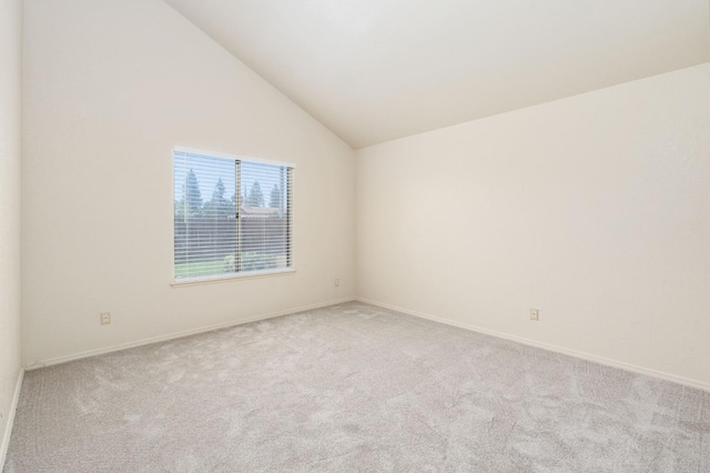 392 W Magill Ave, Clovis, CA 93612 - carpeted spare room featuring lofted ceiling and baseboards
