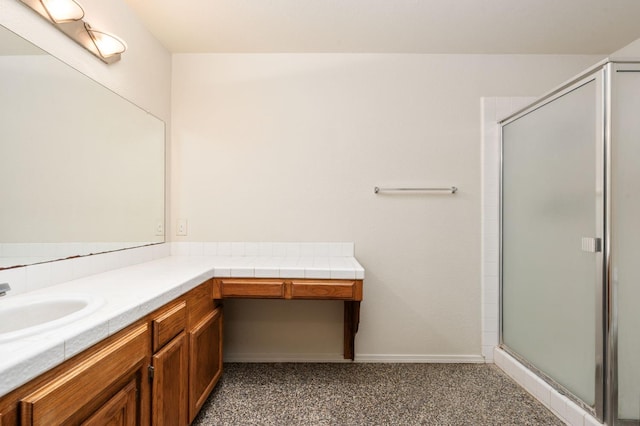 392 W Magill Ave, Clovis, CA 93612 - bathroom featuring vanity, a shower stall, and baseboards