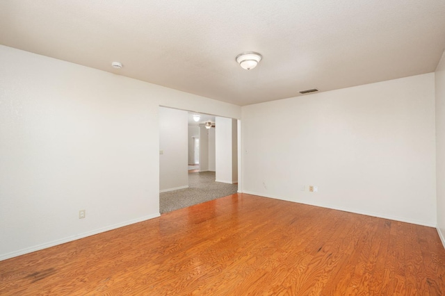 392 W Magill Ave, Clovis, CA 93612 - empty room featuring baseboards and wood finished floors