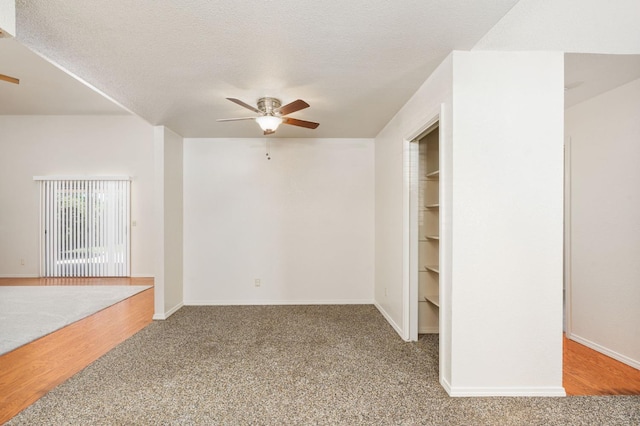 392 W Magill Ave, Clovis, CA 93612 - carpeted empty room with a ceiling fan, baseboards, and a textured ceiling