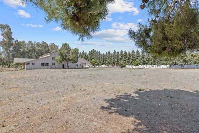 8519 E Olive Ave, Fresno, CA 93737 - view of yard featuring a pole building and an outbuilding