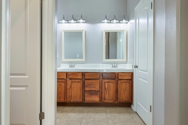 73 W Bordeaux Ln, Clovis, CA 93619 - full bath with double vanity and tile patterned floors