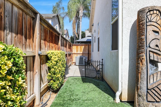 73 W Bordeaux Ln, Clovis, CA 93619 - view of yard featuring central air condition unit and a patio area