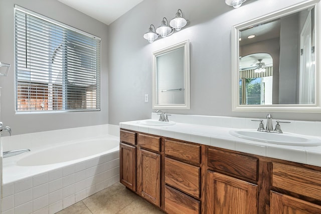 73 W Bordeaux Ln, Clovis, CA 93619 - full bath with a bath, double vanity, tile patterned flooring, and ceiling fan