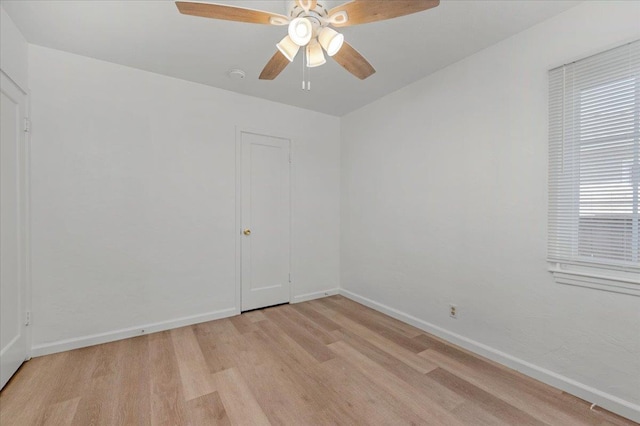 826 W Fedora Ave, Fresno, CA 93705 - unfurnished room with light wood-type flooring, a ceiling fan, and baseboards