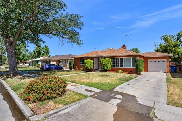826 W Fedora Ave, Fresno, CA 93705 - single story home with an attached garage, concrete driveway, a front lawn, and a chimney